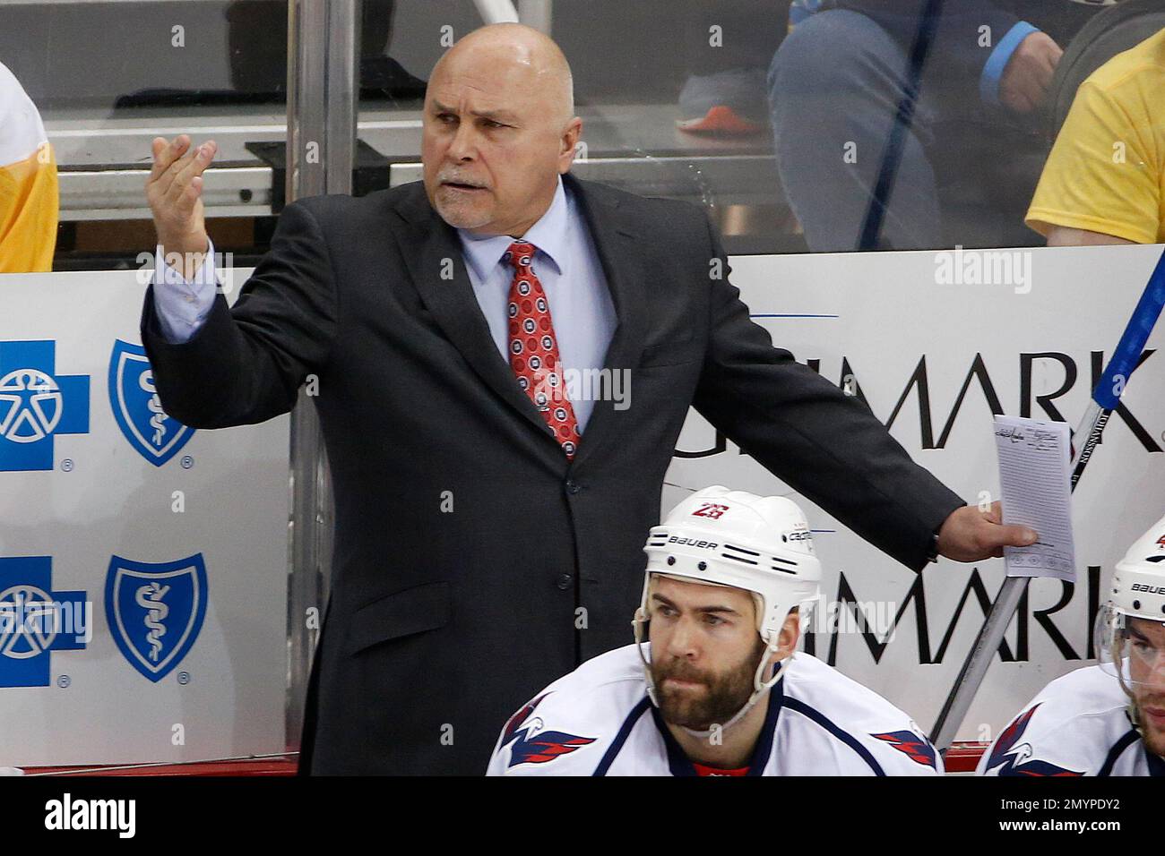Washington Capitals head coach Barry Trotz gives instructions during