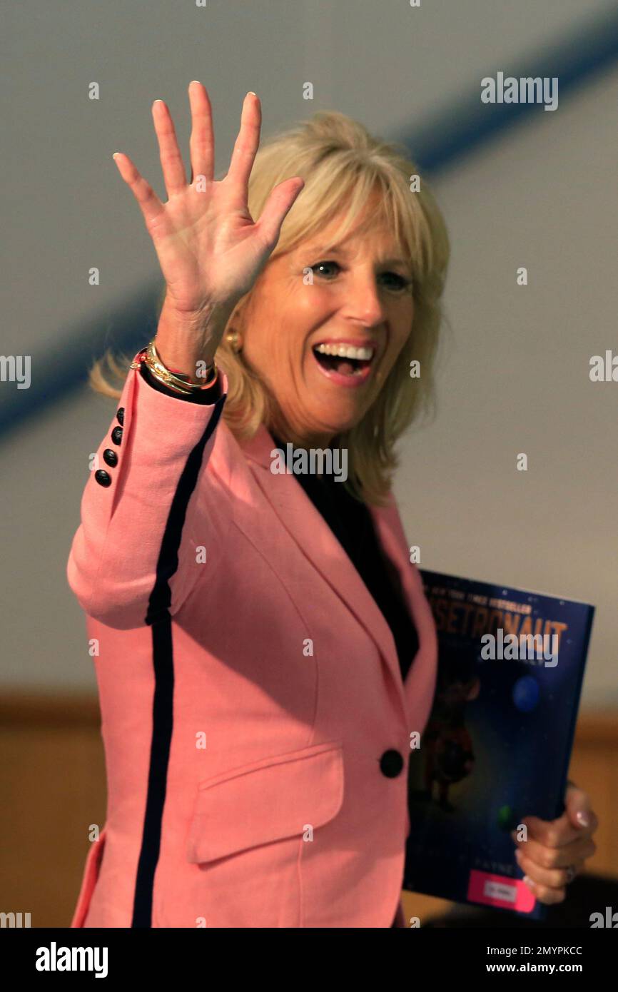 Dr. Jill Biden waves to students at Thayer Elementary School on post at