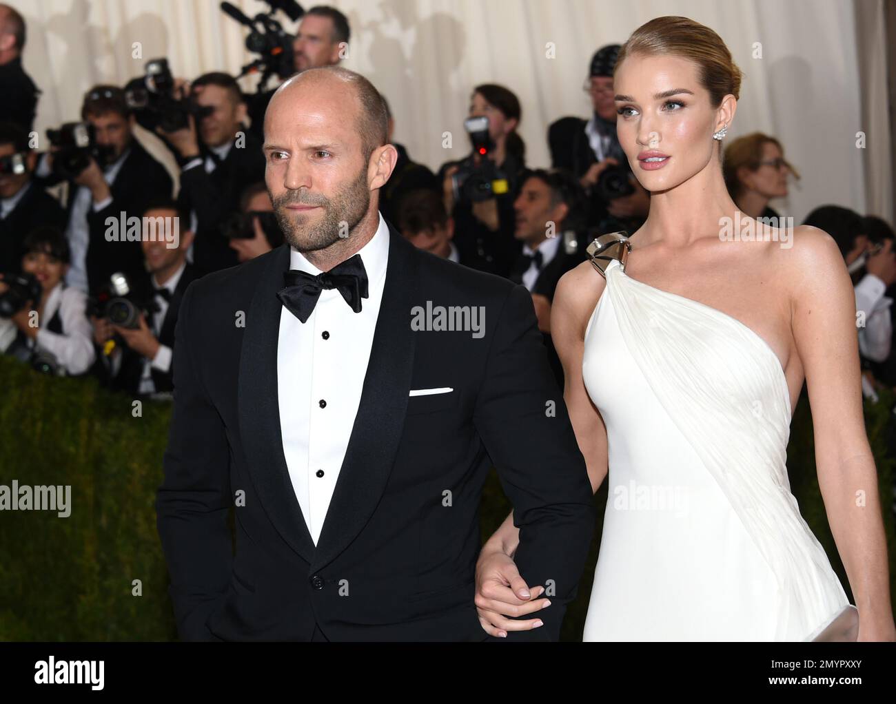 jason-statham-left-and-rosie-huntington-whiteley-arrive-at-the