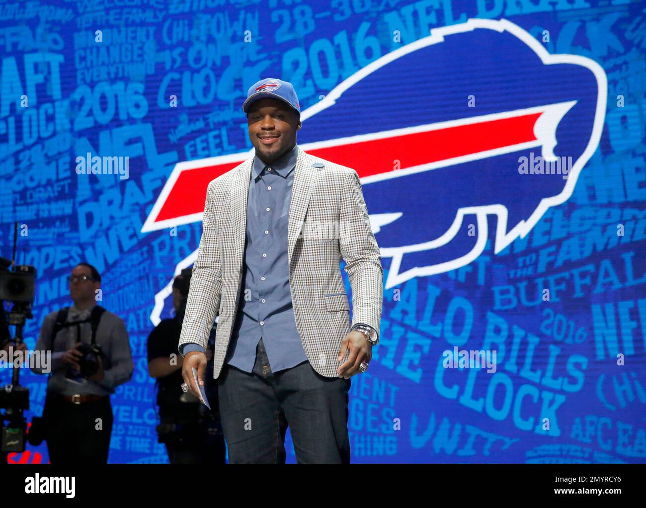 Alabama’s Reggie Ragland poses for photos after being selected by the