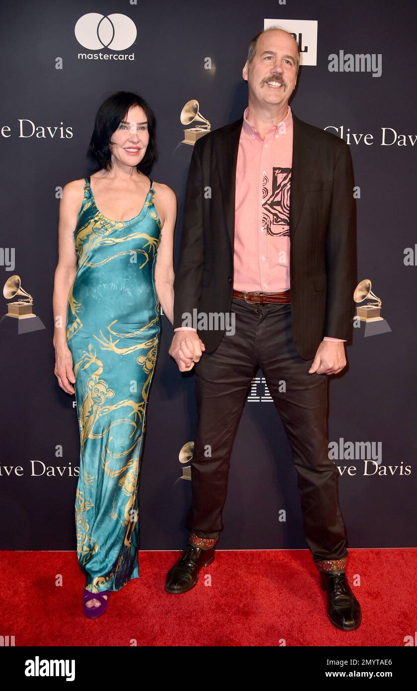 Darbury Stenderu, left, and Krist Novoselic arrive at the PreGrammy Gala on Saturday, Feb. 4