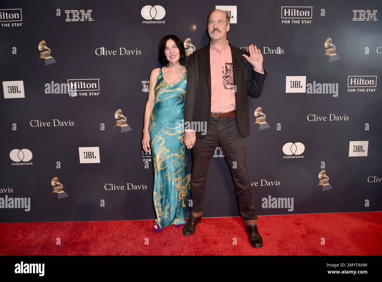 Darbury Stenderu, left, and Krist Novoselic arrive at the Pre-Grammy
