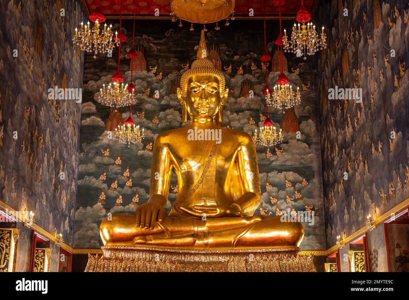 Close up of golden Buddha sculpture in temple. Shakyamuni Buddha is