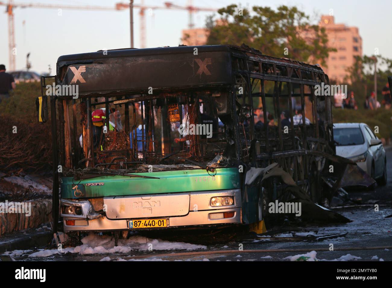 A burned bus is seen in Jerusalem, Monday, April 18, 2016. A bus ...