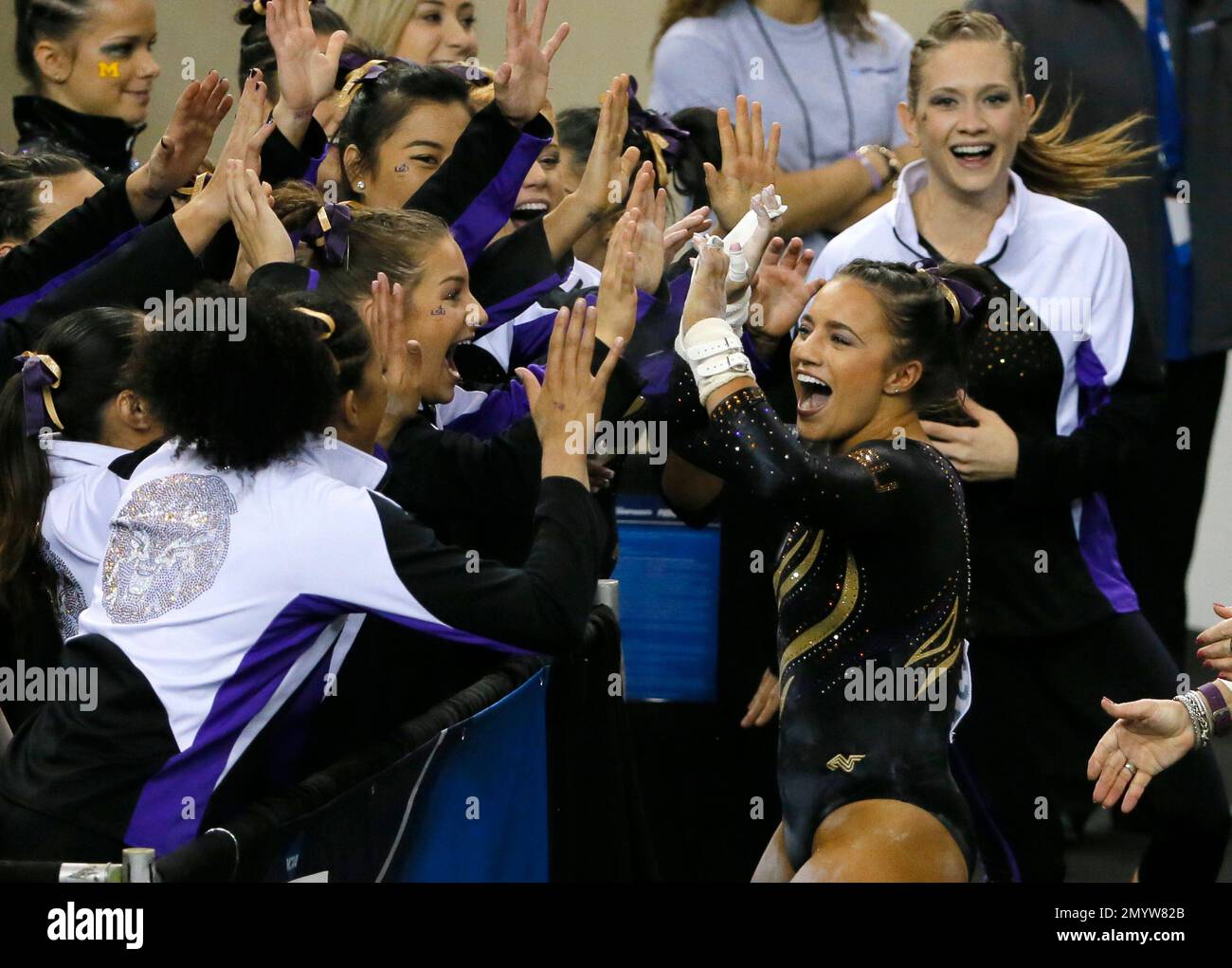 LSU's Lexie Priessman celebrates after performing her uneven parallel