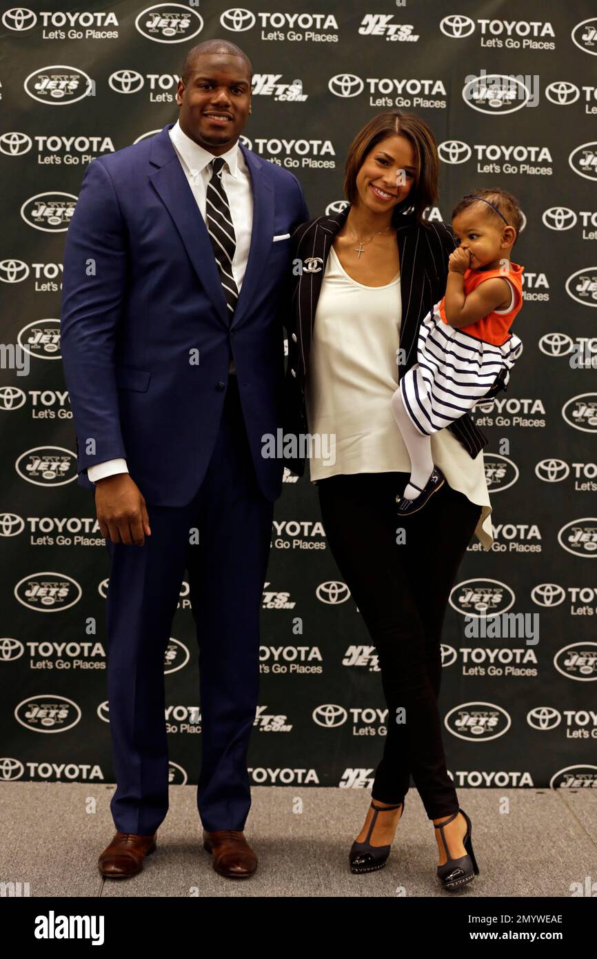 New York Jets' D'Brickashaw Ferguson poses for a photo with New York Jets' D'Brickashaw Ferguson poses for a photo with