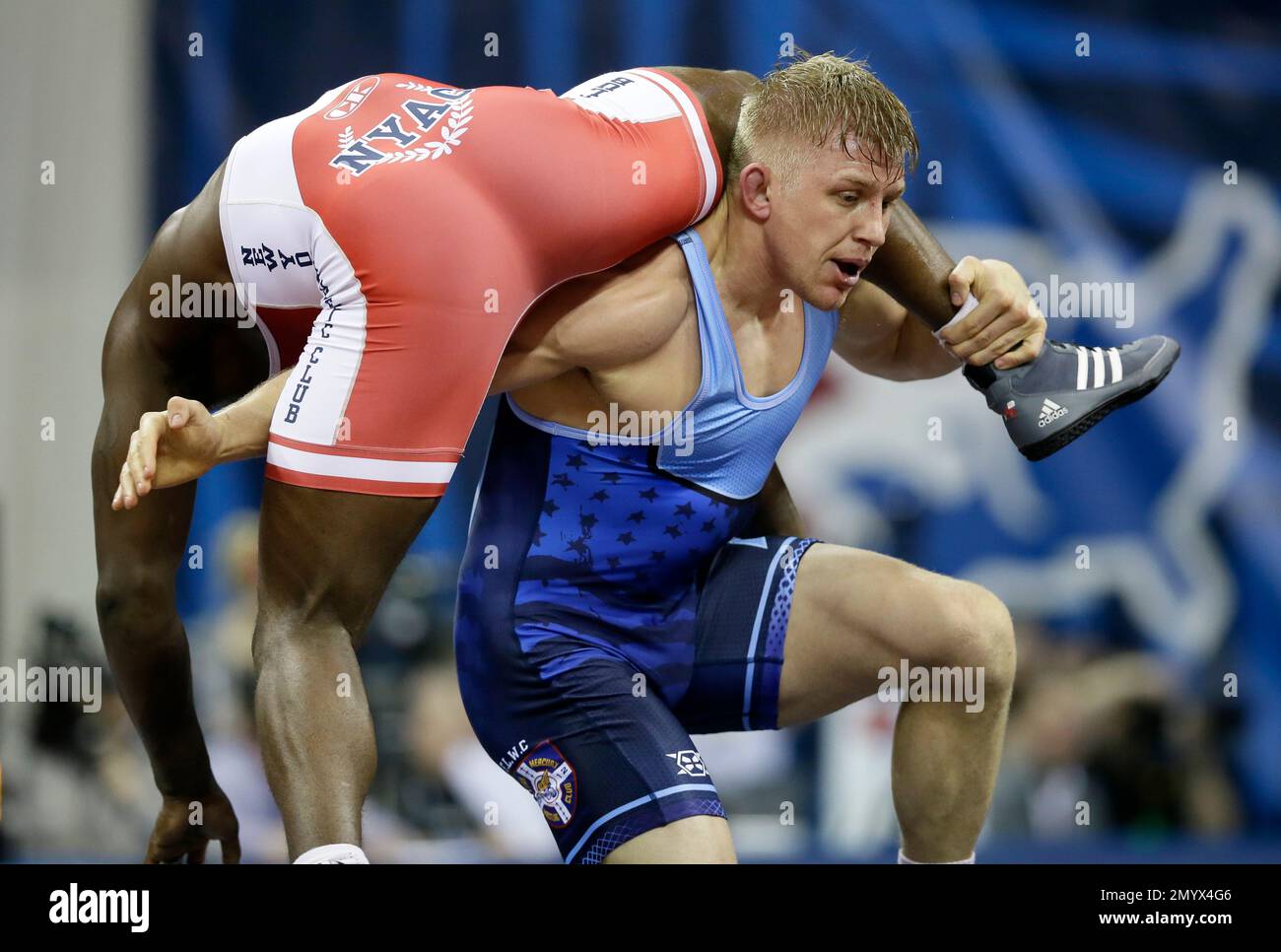 Kyle Dake, right, takes Richard Perry to the mat during their 86-kilogram freestyle match at the U.S