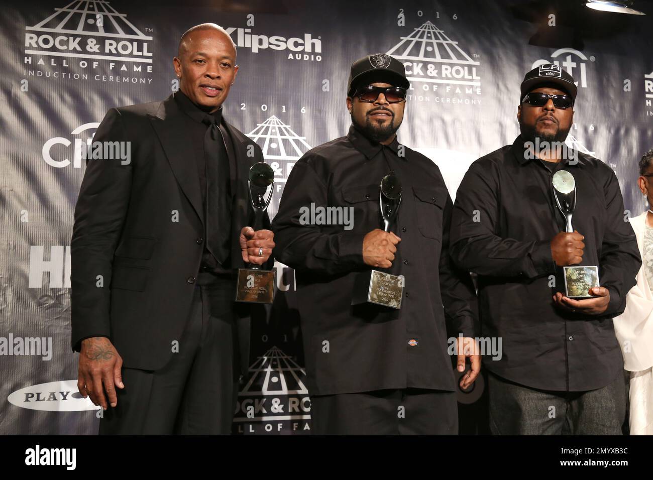 CLEVELAND, OHIO – OCTOBER 30: Cut Creator, Dr. Dre, E-Love, Eminem, LL Cool  J and DJ Z-Trip pose backstage during the 36th Annual Rock & Roll Hall Of  Fame Induction Ceremony at