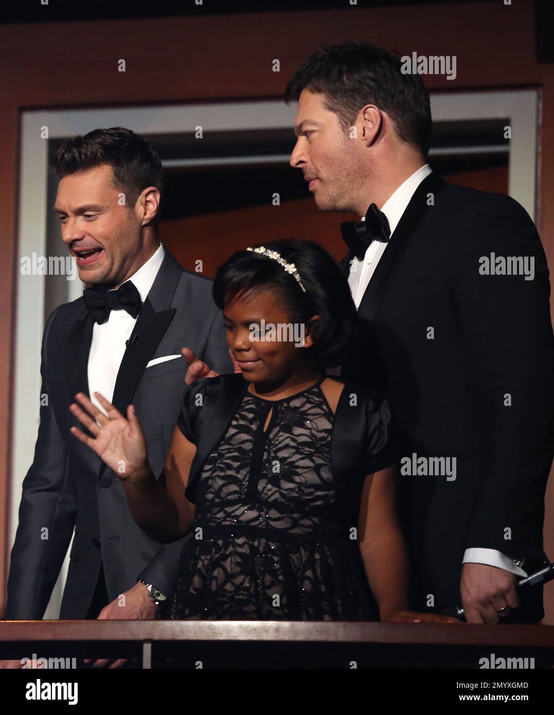 Ryan Seacrest, from left, Marley Fletcher and Harry Connick, Jr. appear