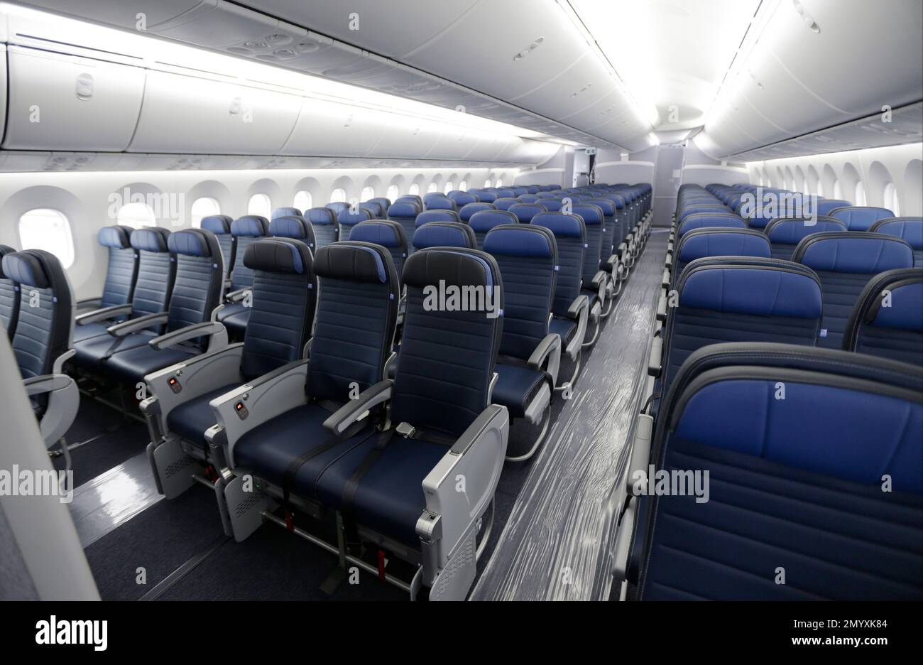 FILE - In this Jan. 26, 2016, file photo, economy class seating is shown on  a new United Airlines Boeing 787-9 undergoing final configuration and  maintenance work at Seattle-Tacoma International Airport in, image size:1300x936