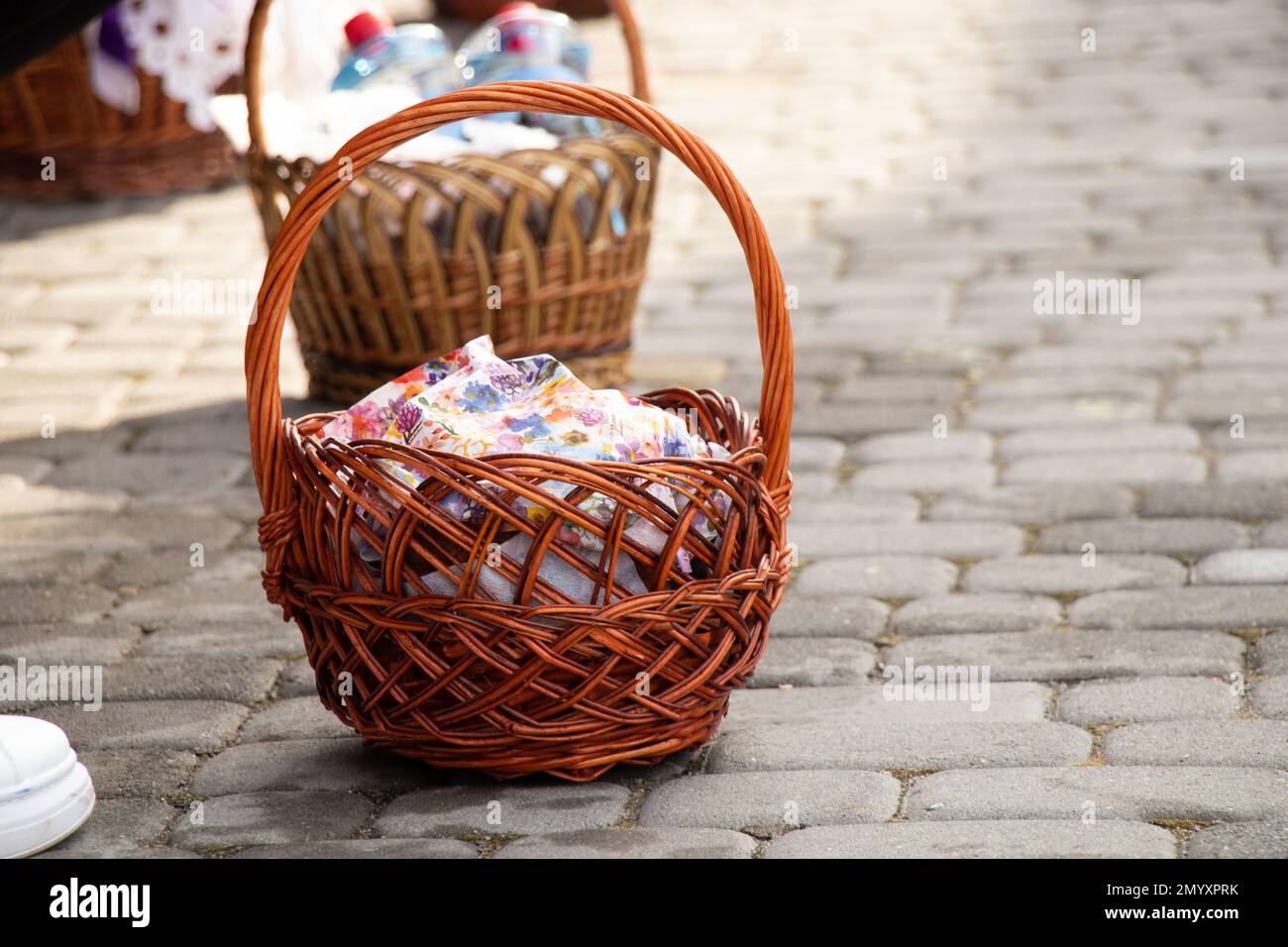 Ukraine Dnipro, Dnipropetrovsk 02.05.2021 - The priest consecrated Easter baskets with food. Christians at the temple. Traditions of celebrating Easte Stock Photo