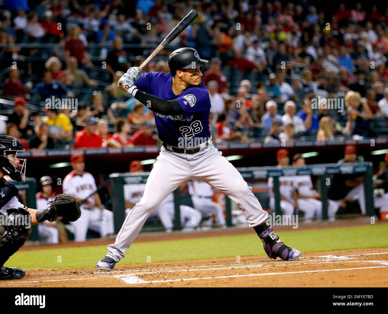 A photo of Nolan Arenado from kindergarten is on the cover of this month's  Rockies' program