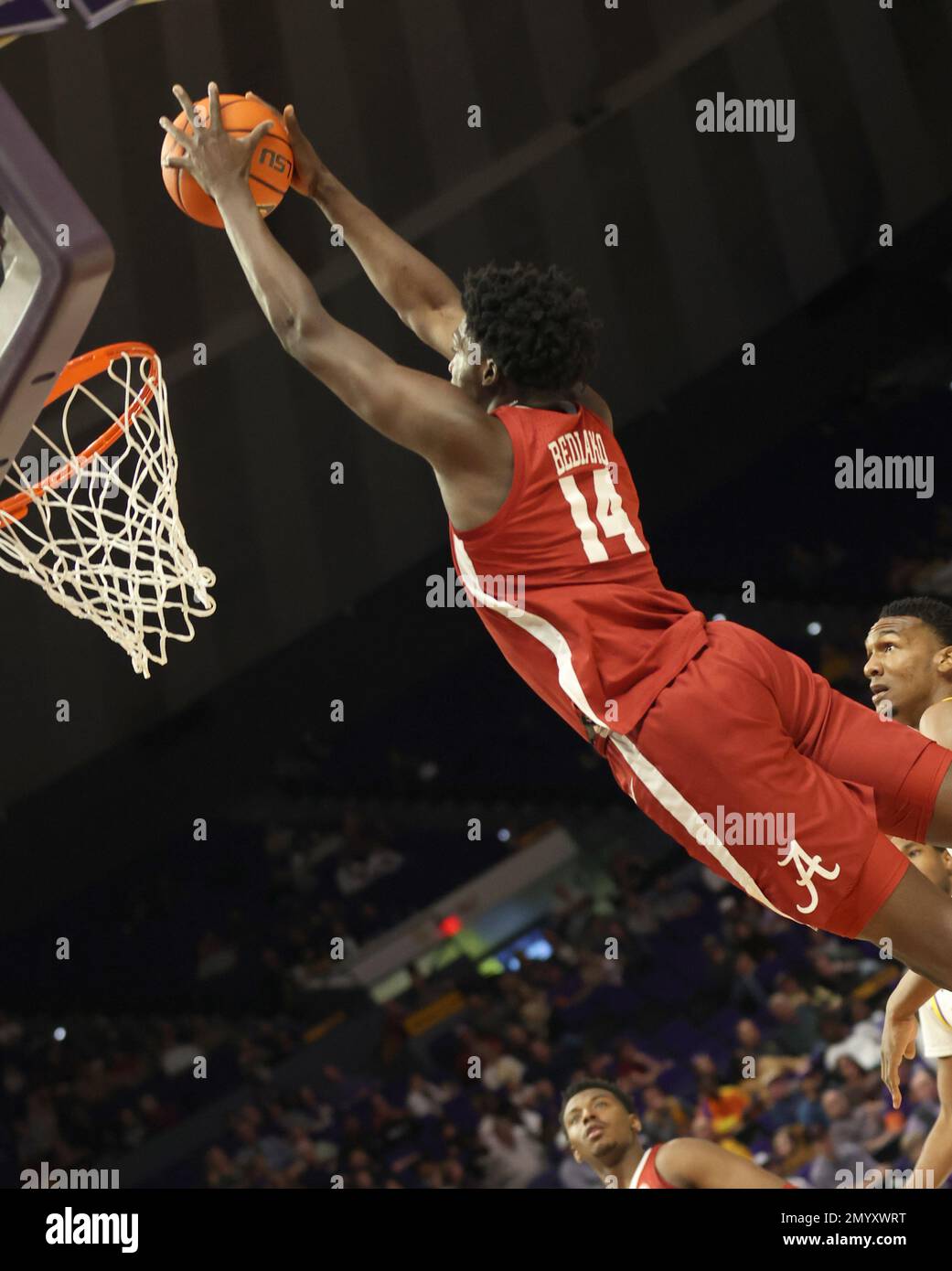 Baton Rouge, USA. 04th Feb, 2023. Alabama Crimson Tide center Charles Bediako (14) throws a breakaway dunk during a men's college basketball game at the Pete Maravich Assembly Center in Baton Rouge, Louisiana on Saturday, February 4, 2023. (Photo by Peter G. Forest/Sipa USA) Credit: Sipa USA/Alamy Live News Stock Photo