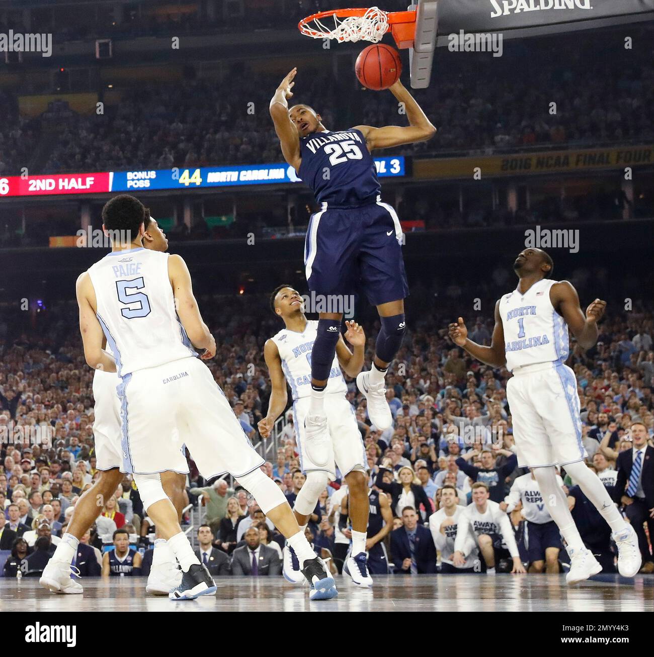 Villanova guard Mikal Bridges (25) moves after a shot against North Carolina during the second half of the NCAA Final Four tournament college basketball championship game Monday, April 4, 2016, in Houston. (AP Photo/Eric Gay) Stock Photo