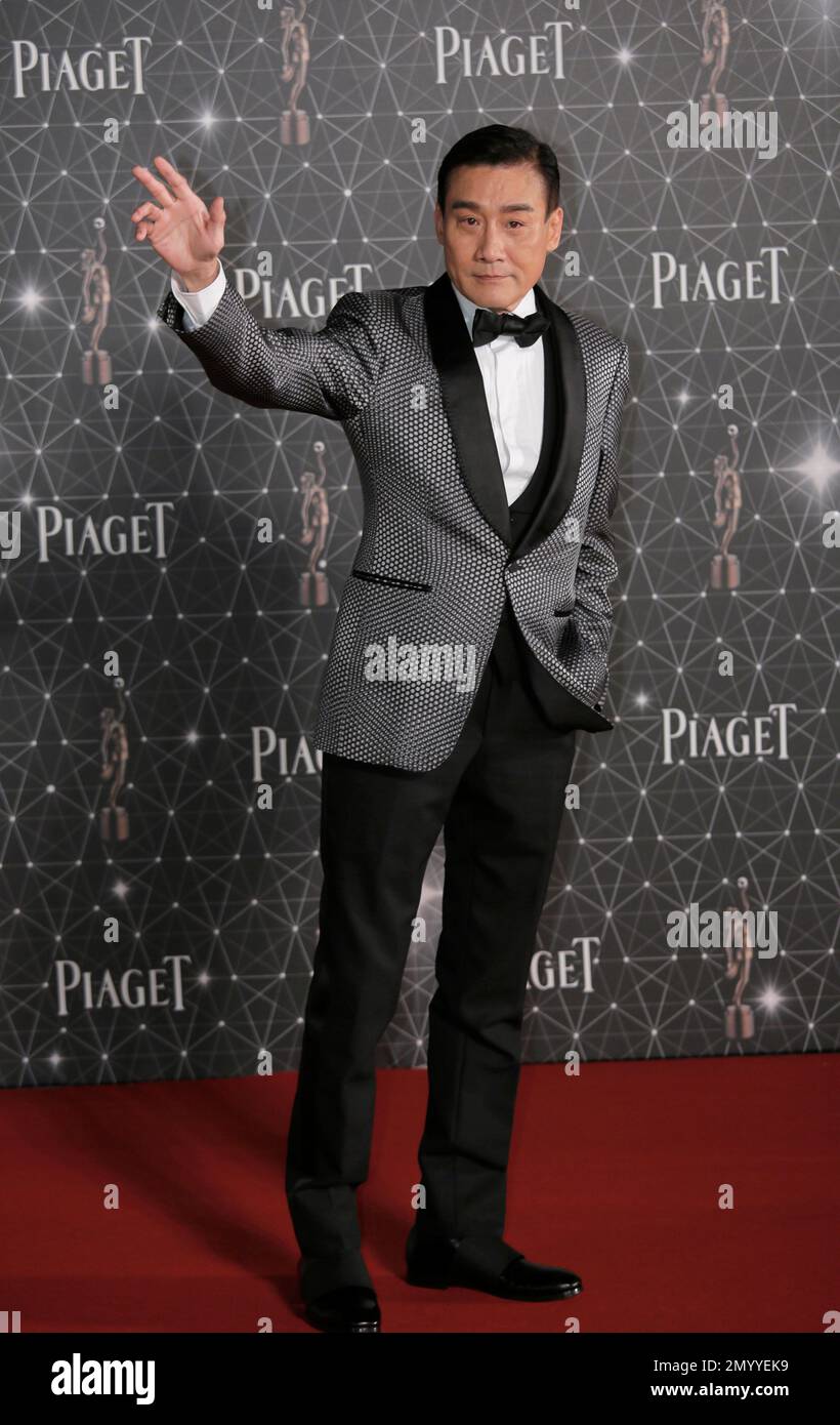 Hong Kong actor Tony Leung Ka-fai poses on the red carpet of the Hong