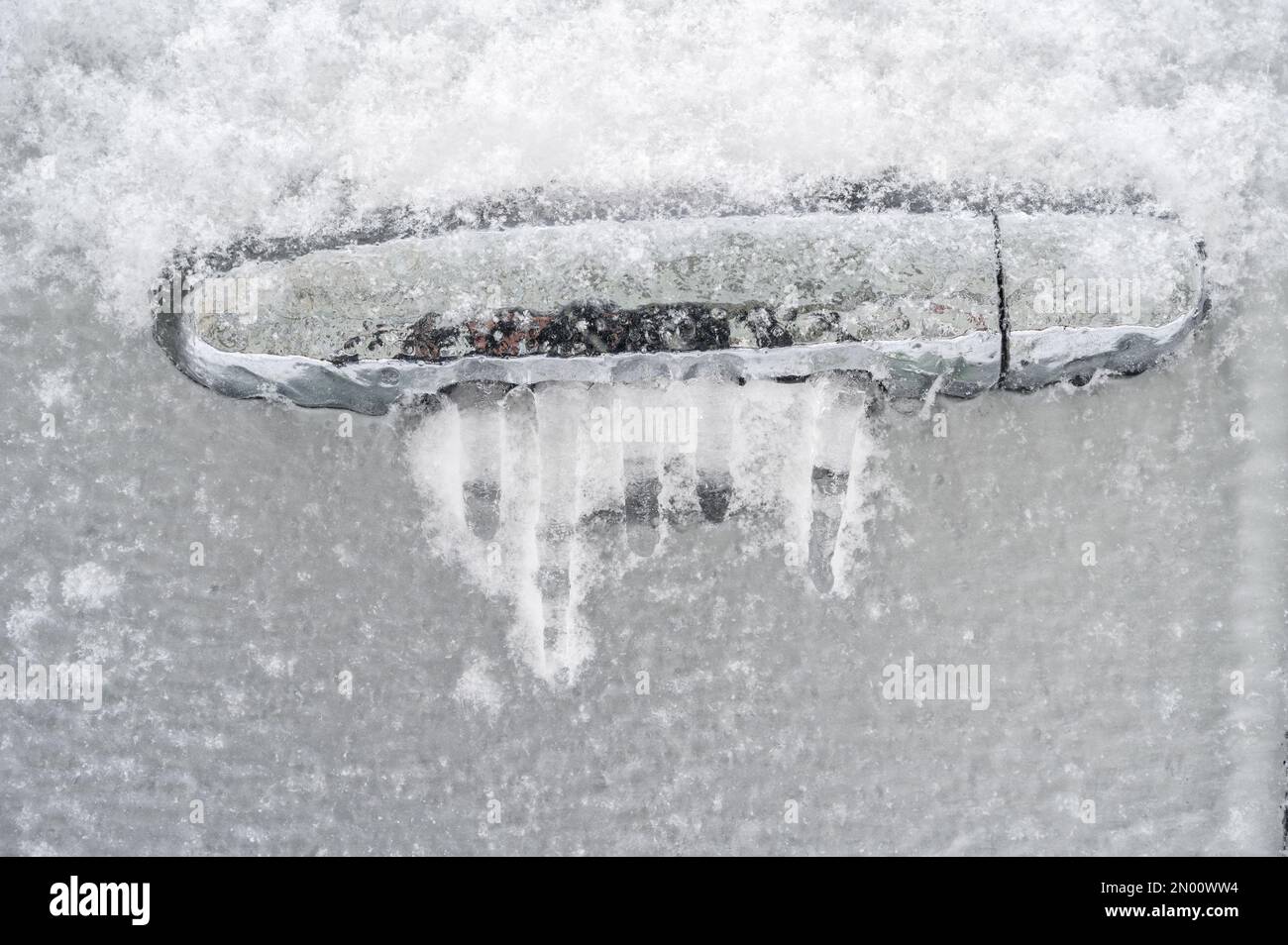 Car door handle is frozen and jammed Stock Photo Alamy