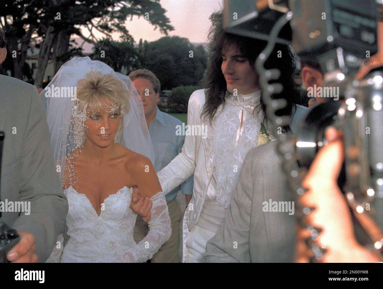 Actress Heather Locklear and rock drummer Tommy Lee of Mötley Crüe, leave  their wedding ceremony in Santa Barbara, Calif., May 10, 1986, en route to  the reception. Locklear is the co-star of