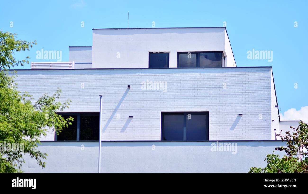 Image showcasing Modern residential building with new apartments in a green residential ...