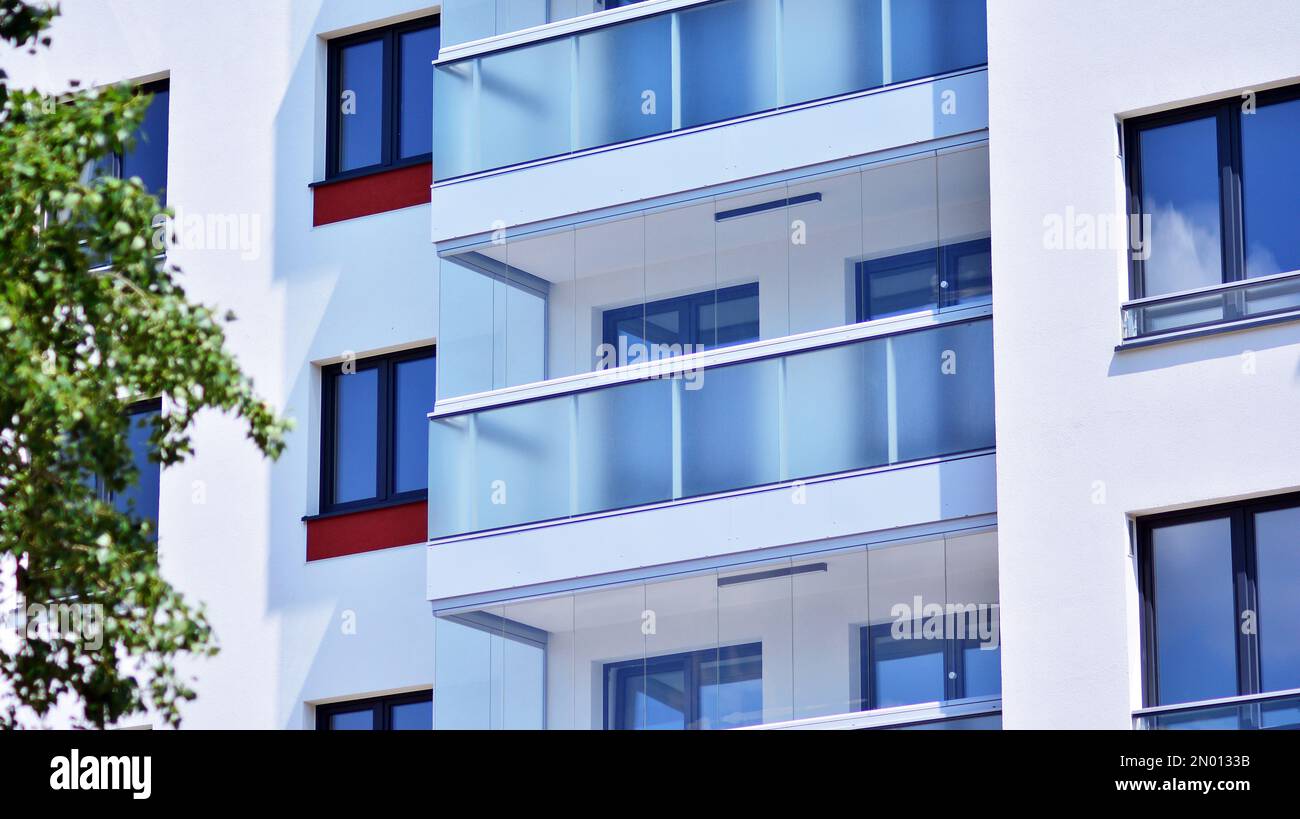 Modern residential building with new apartments in a green residential ... - High Density Green Apartment Building