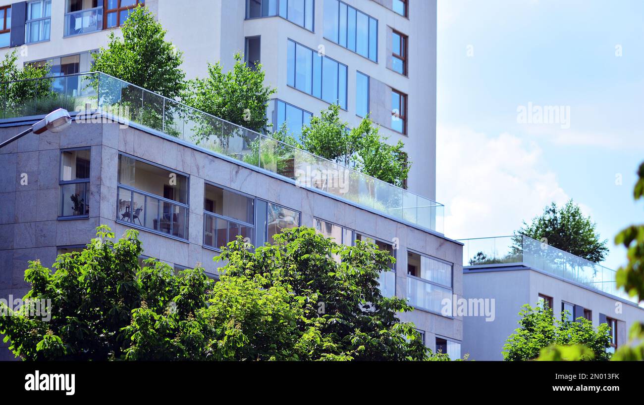 Modern residential building with new apartments in a green residential ...