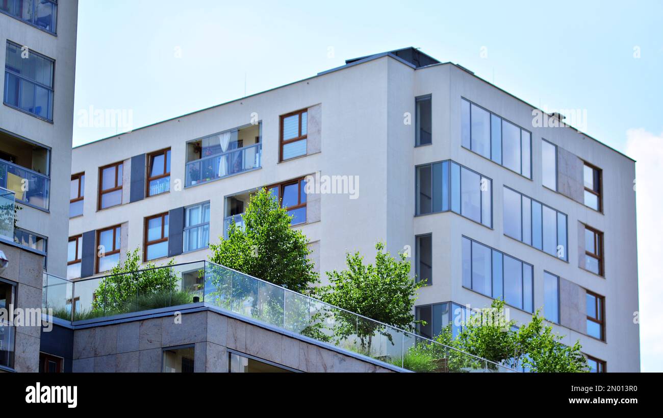 Modern residential building with new apartments in a green residential ...