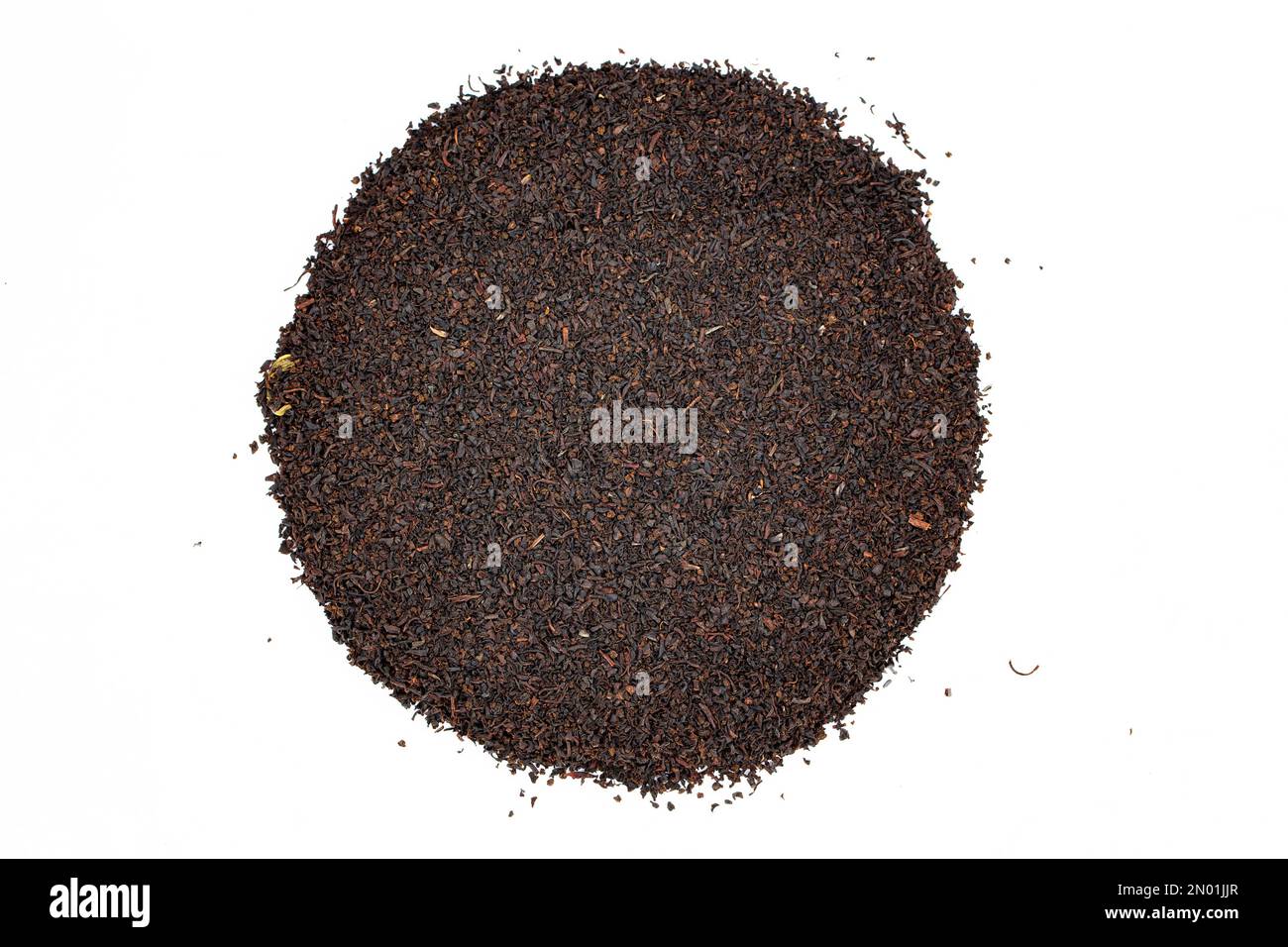 Dry black tea leaves isolated on white background. Black Ceylon tea