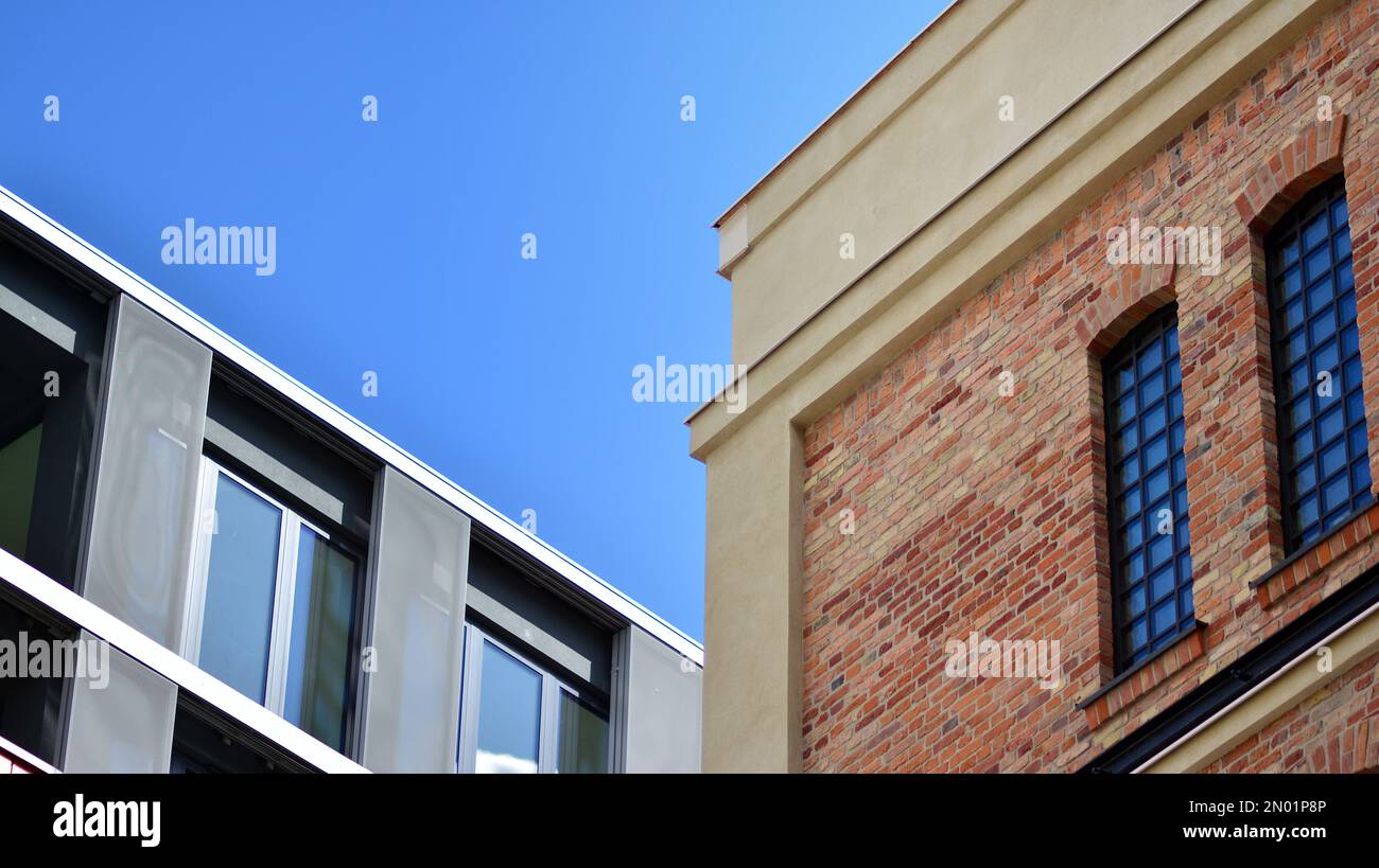 Picture of Modern brick and glass facade of the office building. A contrasting ...
