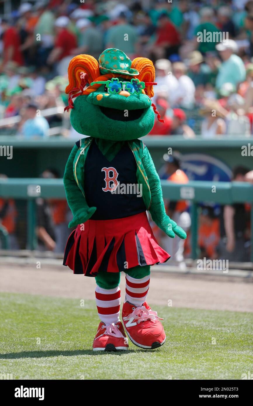 BOSTON, MA - FEBRUARY 03: Boston Red Sox mascot, Tessie the Green Monster,  tosses soft baseballs to fans while on a flatbed truck ahead of the spring  training equipment truck as it departs on Boston Red Sox Truck Day on  February 3, 2023, at Fenway