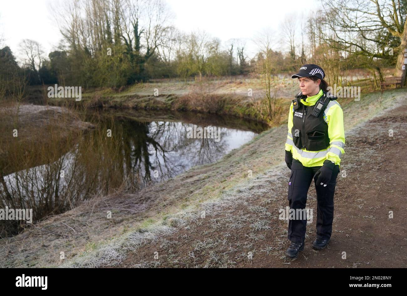 A PCSO walks along the River Wyre in St Michael's on Wyre, Lancashire, as police continue their search for missing woman Nicola Bulley, 45, who was last seen on the morning of Friday January 27, when she was spotted walking her dog on a footpath by the nearby River Wyre. Picture date: Sunday February 5, 2023. Stock Photo