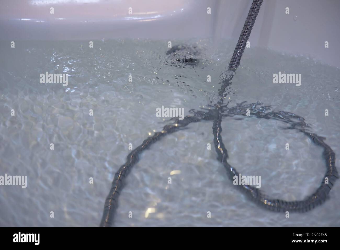 Soap bubbles background. Shampoo foam in the water in bathroom. Jacuzzi