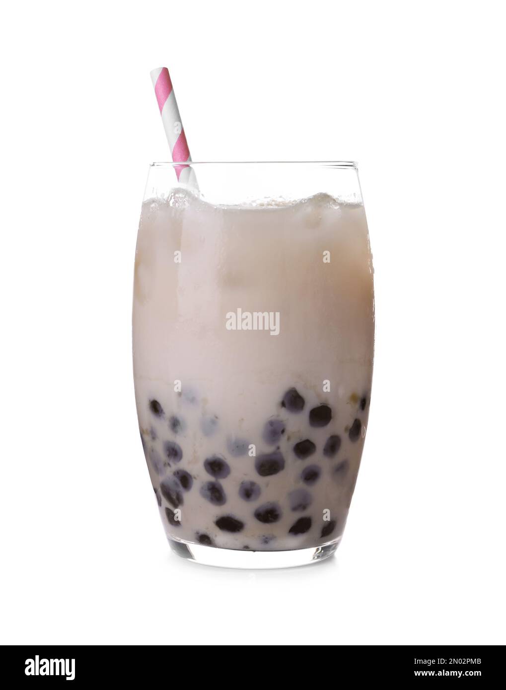Bubble milk tea with tapioca balls in glass isolated on white Stock