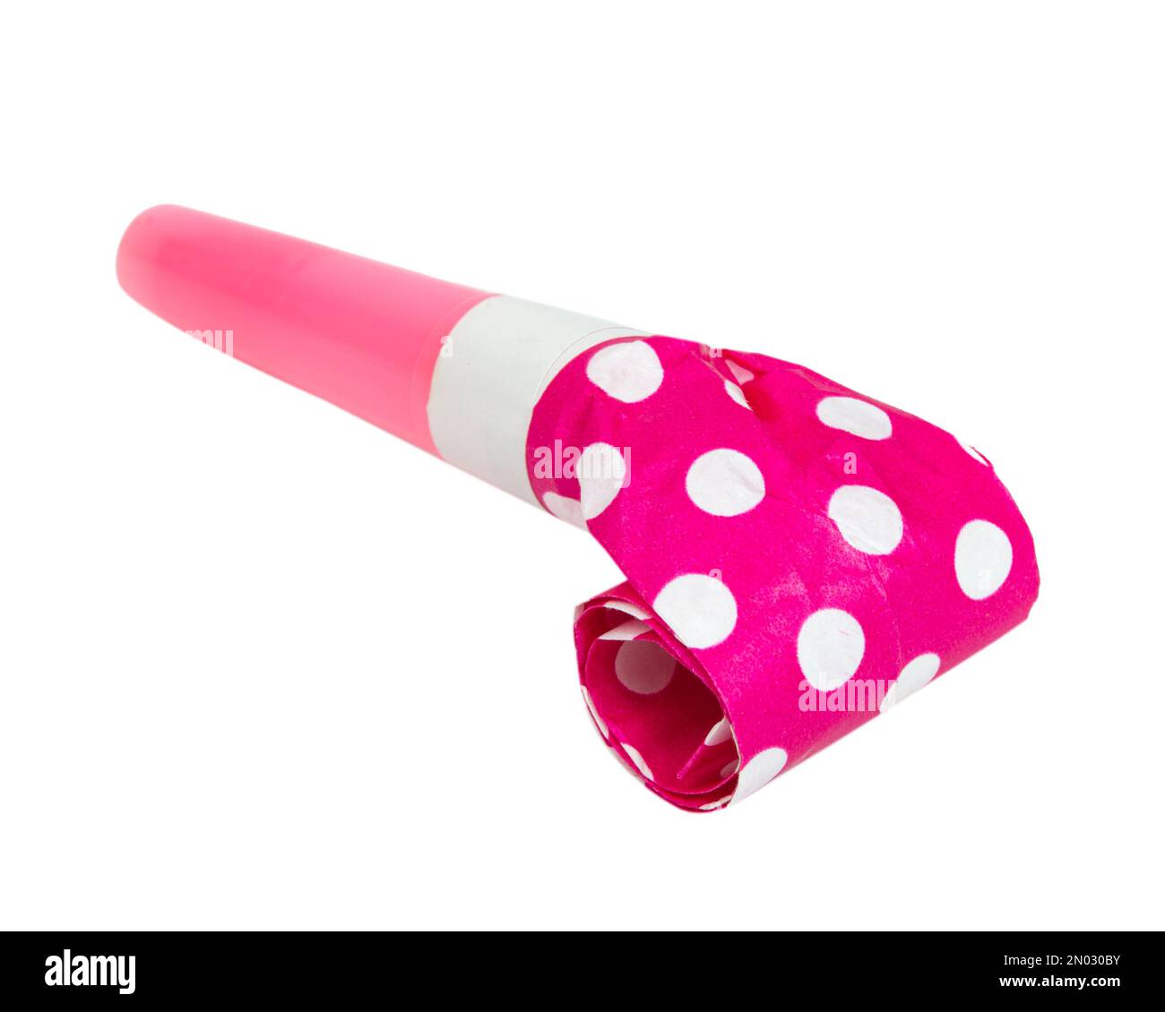 Party horn blowout in dots isolated on the white background Stock Photo