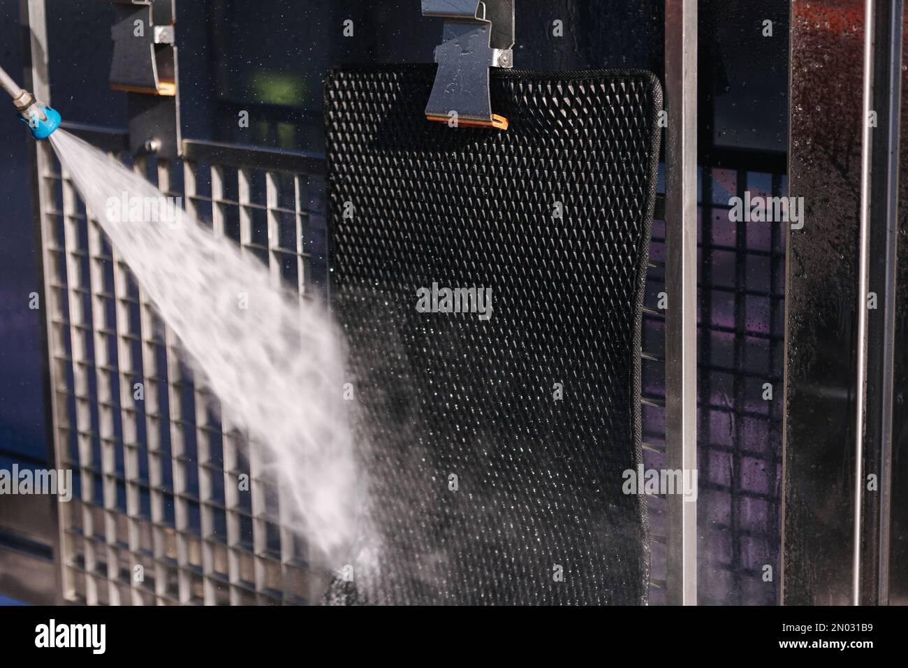 Cleaning mats at the self servise car washing Stock Photo Alamy