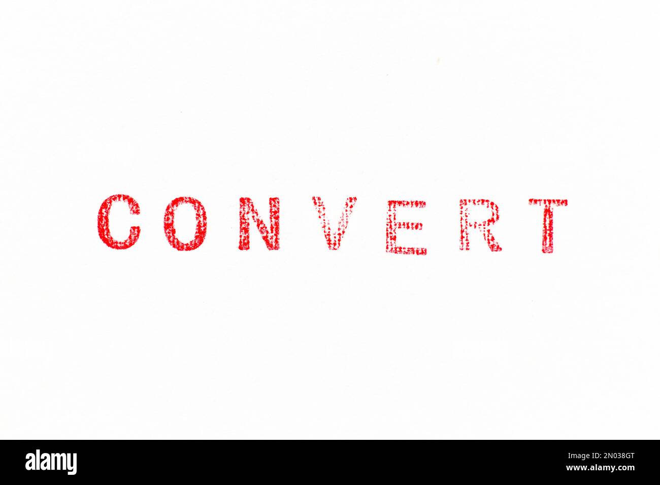 Red color rubber stamp in word convert on white paper background Stock