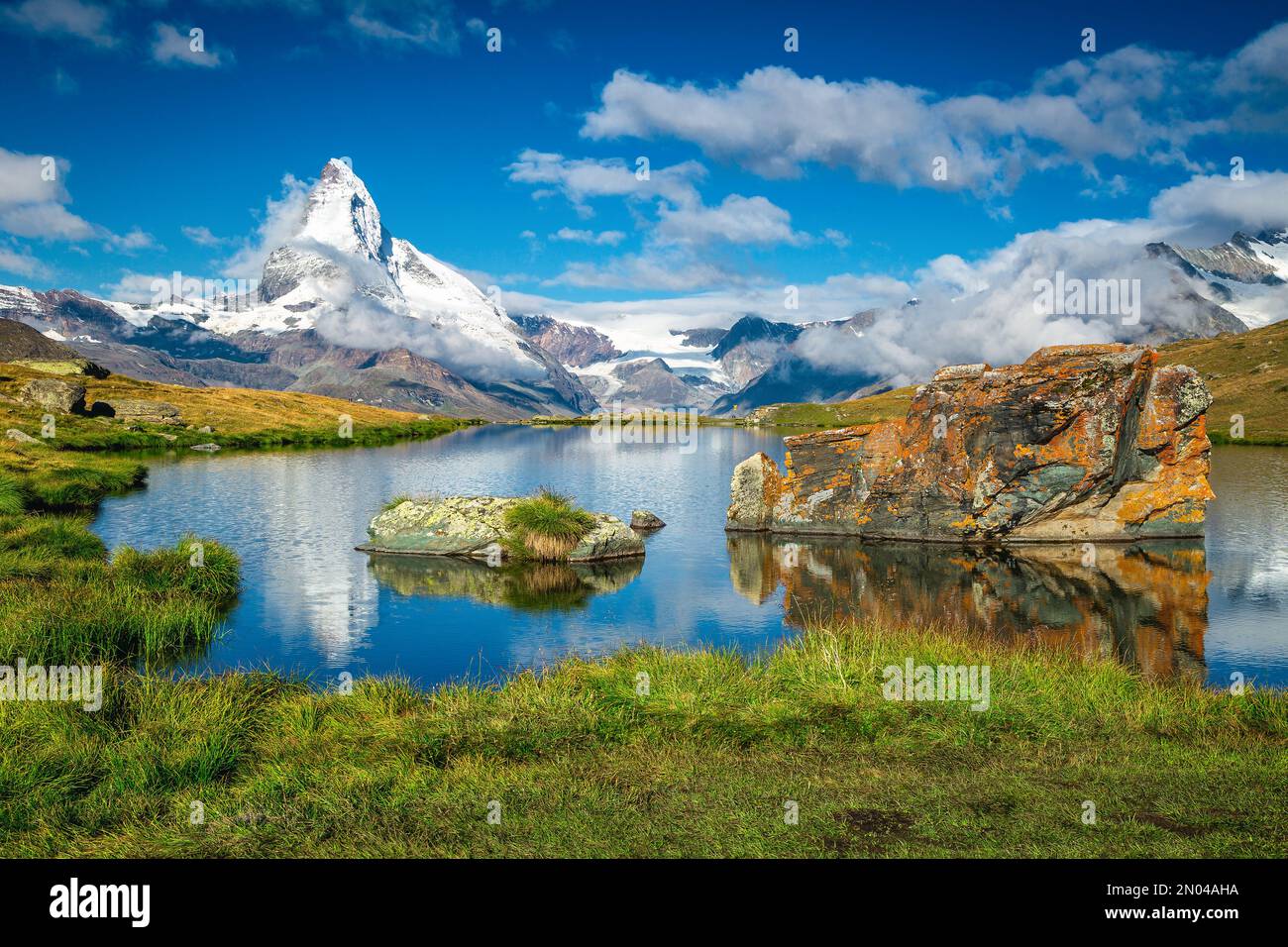 One of the most beautiful mountain of the world, Matterhorn view from the  picturesque Stellisee lake, Zermatt, Canton of Valais, Switzerland, Europe  Stock Photo - Alamy, image size:1300x956