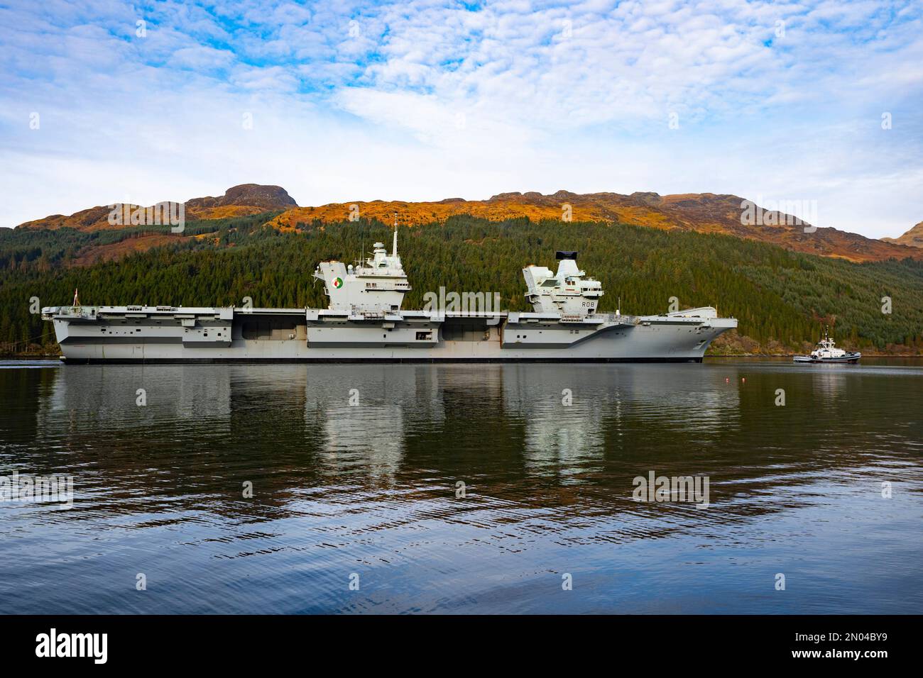 Glenmallan, Argyll and Bute, Scotland, UK. 5 February 2023.  Royal Navy aircraft carrier HMS Queen Elizabeth arrives at Glenmallan on Loch Long this morning to receive supplies of munitions prior to her next deployment.  Credit Iain Masterton/Alamy Live News Stock Photo