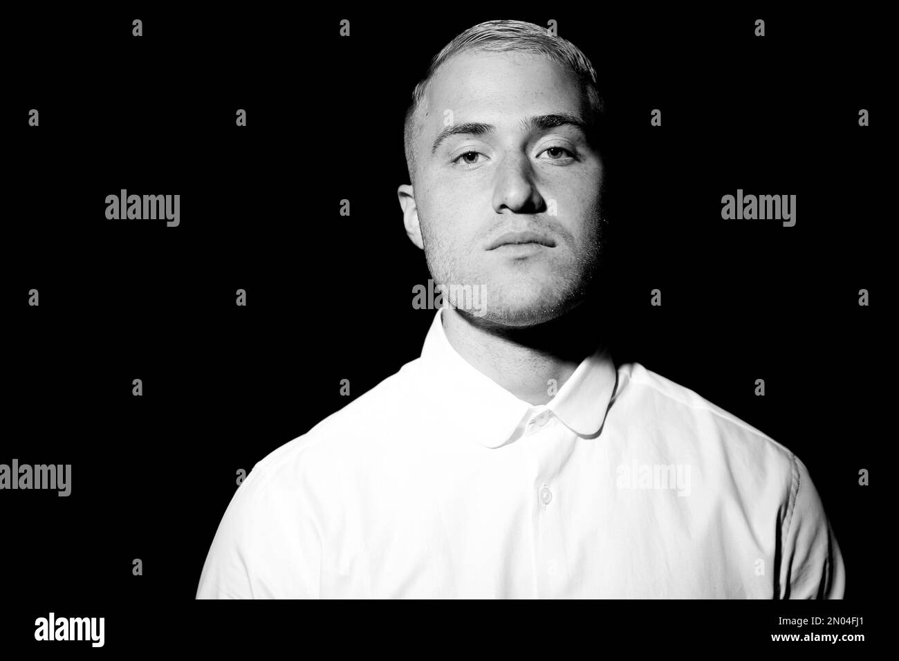 In this March 4, 2016 photo, singer-songwriter Mike Posner poses for a