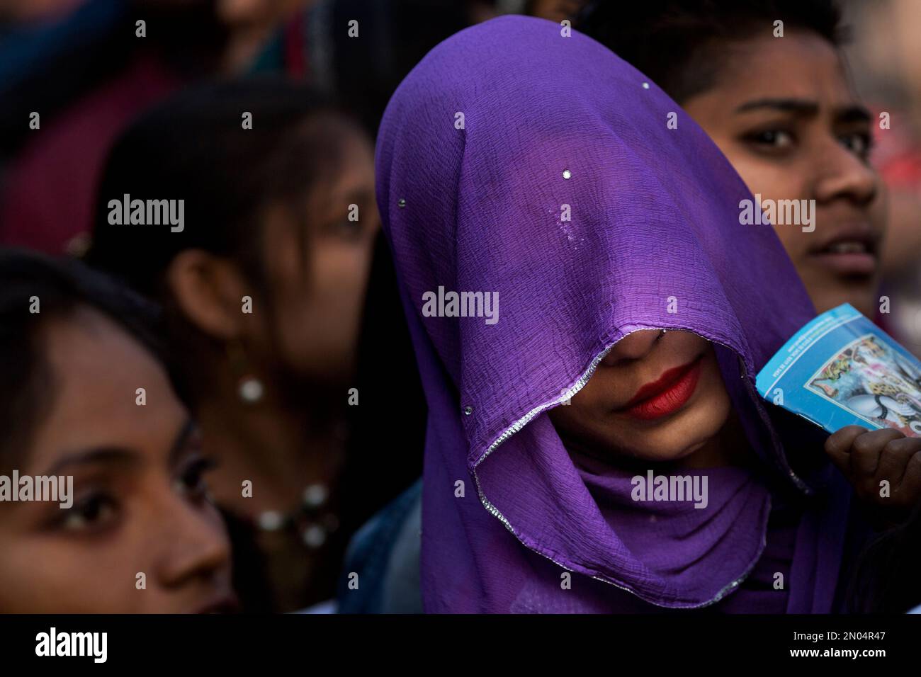 a-hindu-devotees-waits-in-a-queue-to-offer-prayers-at-a-shiva-temple-on