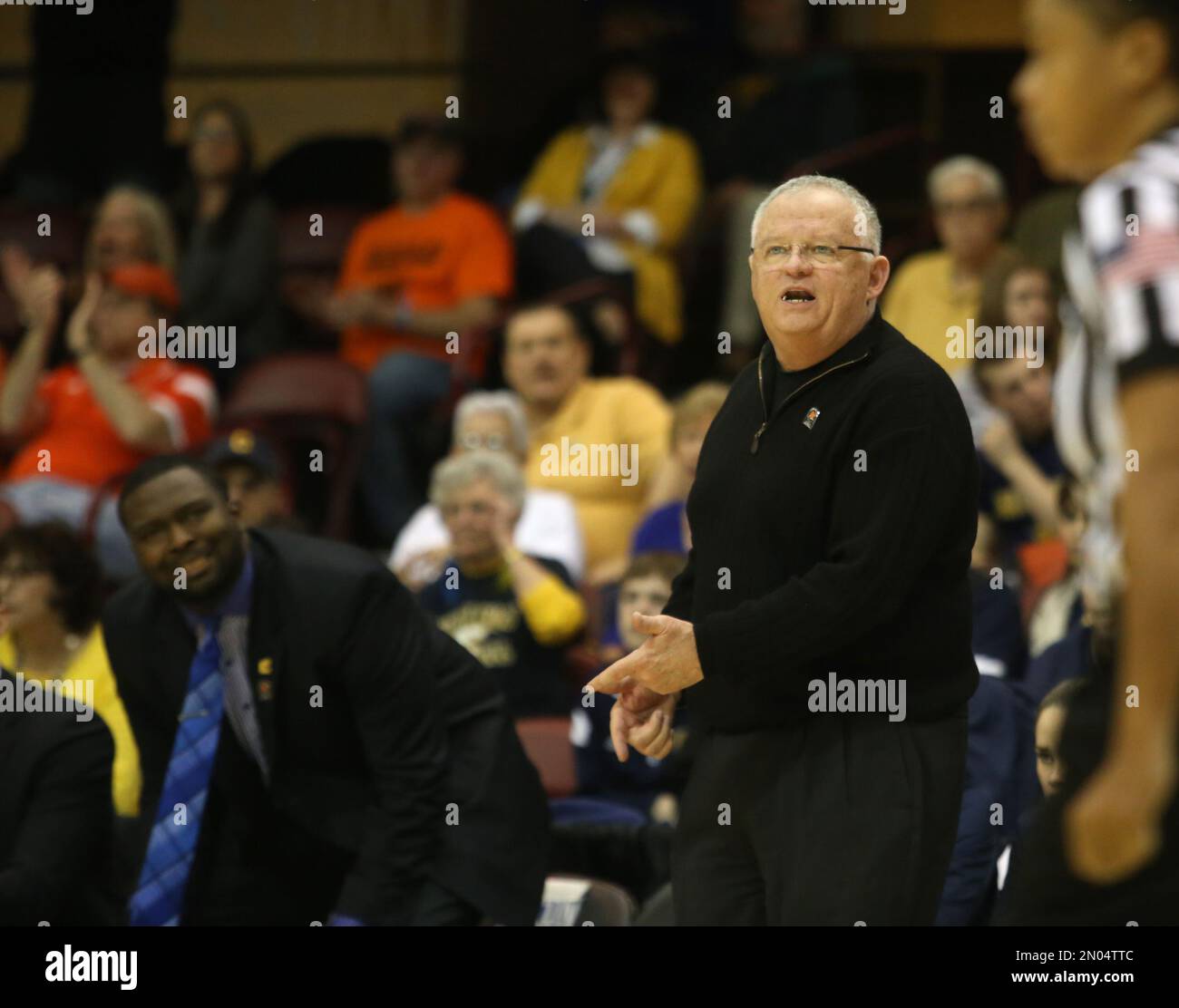 Chattanooga women's basketball coach Jim Foster yells out a play during the  first half of the championship game of the NCAA women's Southern Conference  basketball tournament in Asheville, N.C., Sunday, March 6,