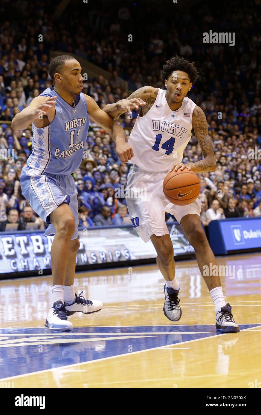 North Carolina's Brice Johnson (11) guards Duke's Brandon Ingram (14