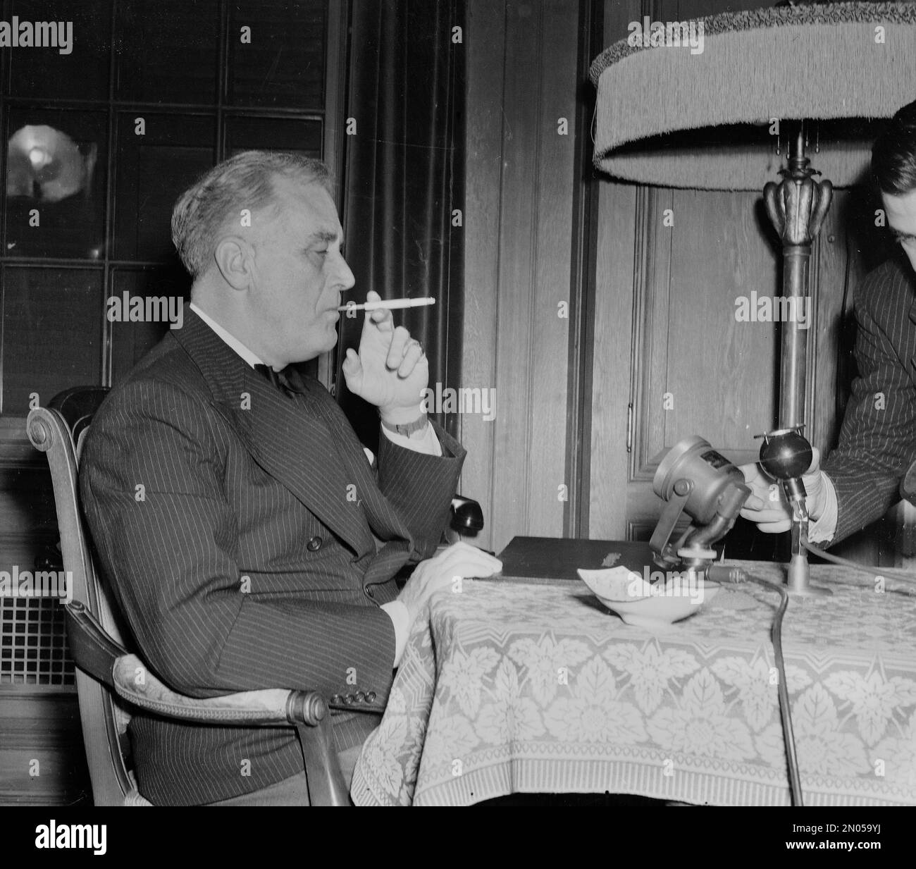 President Franklin D. Roosevelt enjoys a smoke, Nov. 1938. (AP Photo Stock  Photo