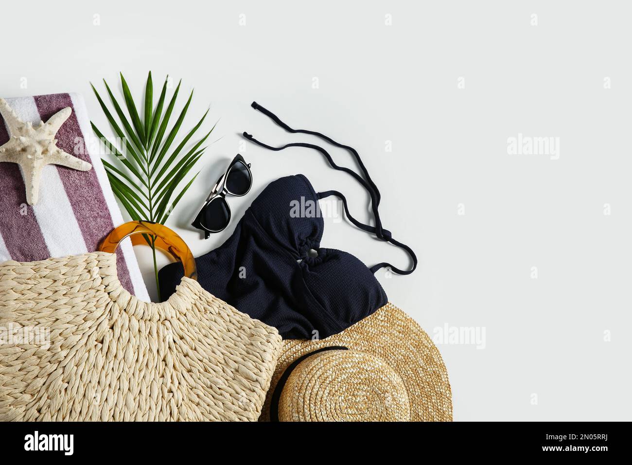 Composition with stylish beach accessories on white background, top view Stock Photo