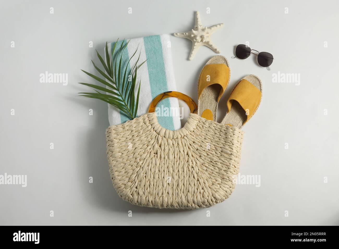 Composition with stylish beach accessories on white background, top view Stock Photo