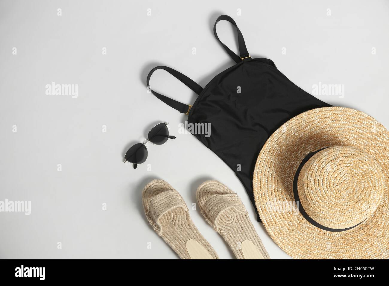 Composition with stylish beach accessories on white background, top view Stock Photo