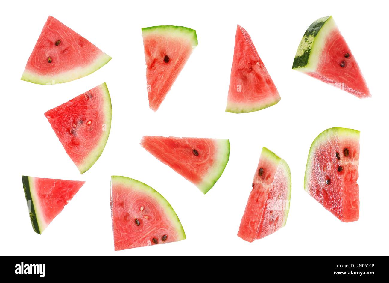 Fresh watermelon pieces falling on white background Stock Photo - Alamy