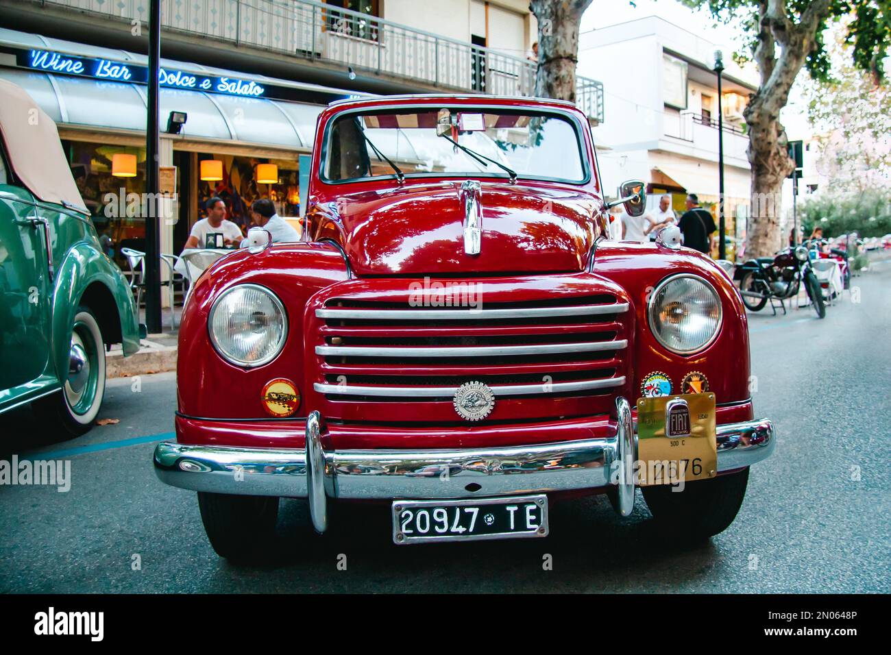 Vintage car at an outdoor event. An italian red Fiat 500 Topolino convertible at an event for car collectors Stock Photo