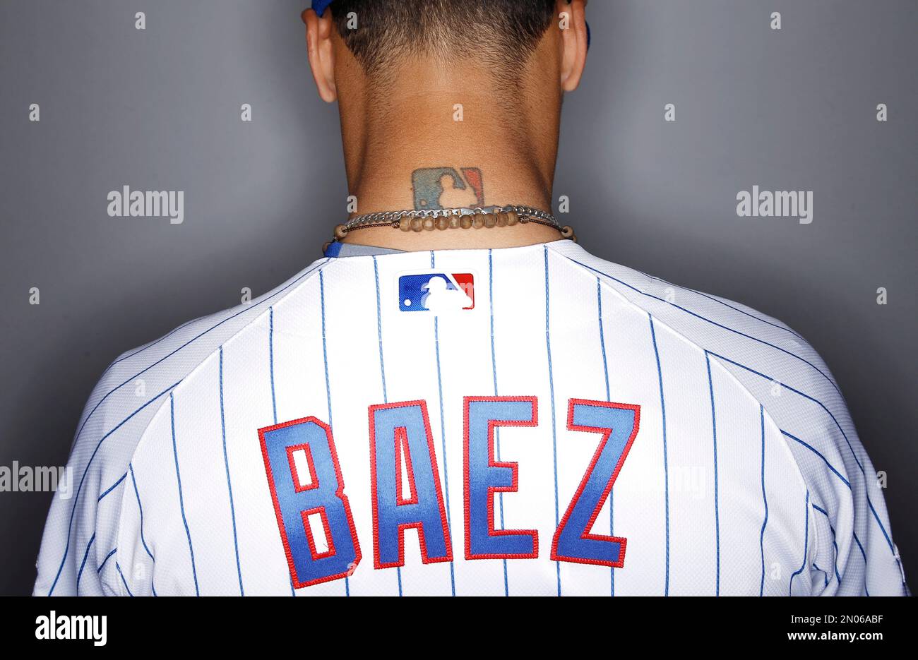 Chicago Cubs' Javier Baez shows off his Major League Baseball tattoo during  the teams photo day Monday, Feb. 29, 2016, in Mesa, Ariz. (AP Photo/Morry  Gash Stock Photo - Alamy