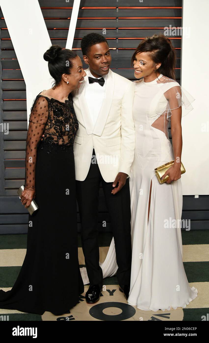 Rosalie Rock, from left, Chris Rock and Megalyn Echikunwoke arrive at the  Vanity Fair Oscar Party on Sunday, Feb. 28, 2016, in Beverly Hills, Calif.  (Photo by Evan Agostini/Invision/AP Stock Photo -, image size:851x1390