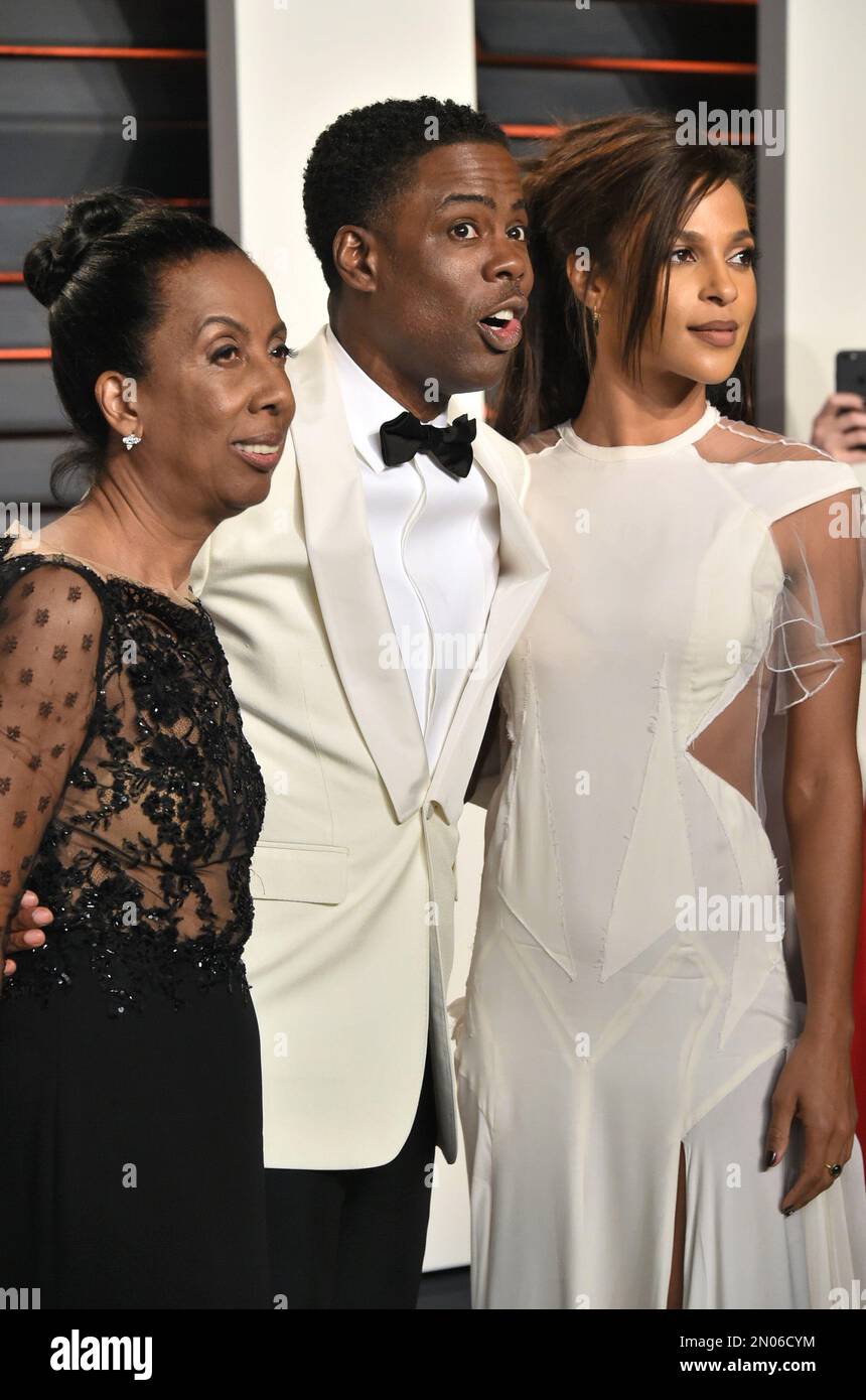 Rosalie Rock, from left, Chris Rock and Megalyn Echikunwoke arrive at the  Vanity Fair Oscar Party on Sunday, Feb. 28, 2016, in Beverly Hills, Calif.  (Photo by Evan Agostini/Invision/AP Stock Photo -, image size:860x1390