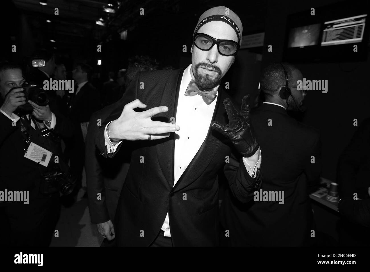 Sacha Baron Cohen appears backstage at the Oscars on Sunday, Feb. 28, 2016, at the Dolby Theatre